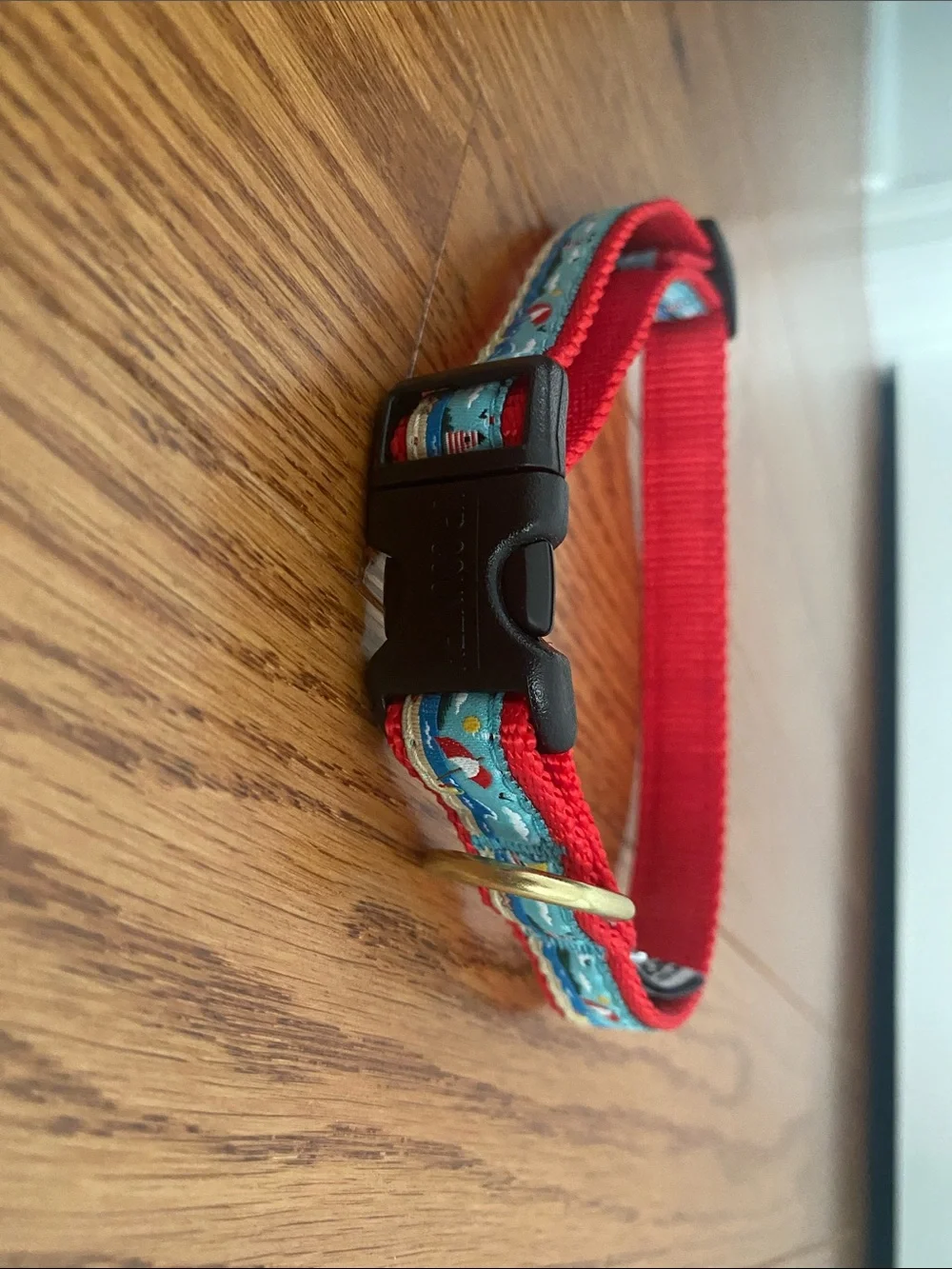 Red Patterned Dog Collar with Blue Sailboat Accent by Unknown